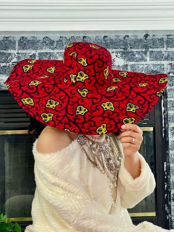 Red and yellow patterned sun hat.