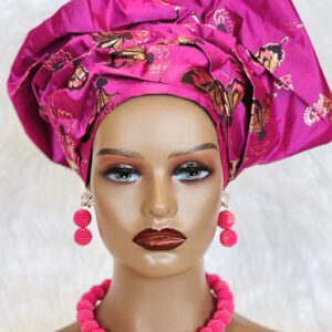 Pink beaded jewelry set with headwrap.
