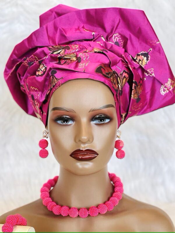 Pink beaded jewelry set with headwrap.