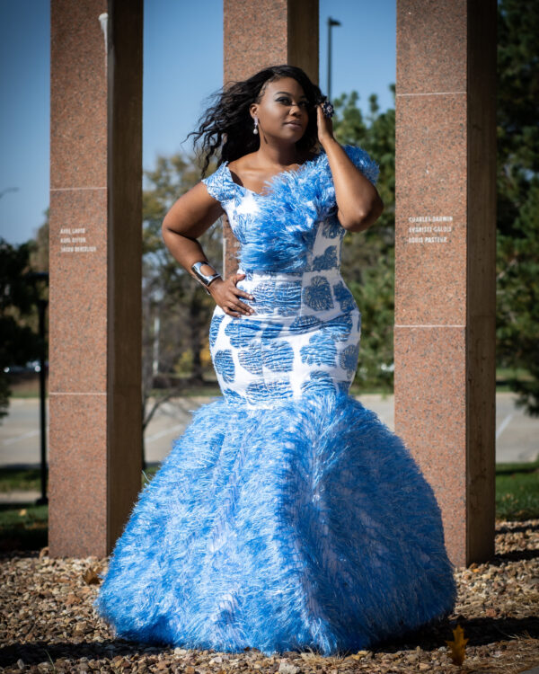 Woman in a blue and white dress