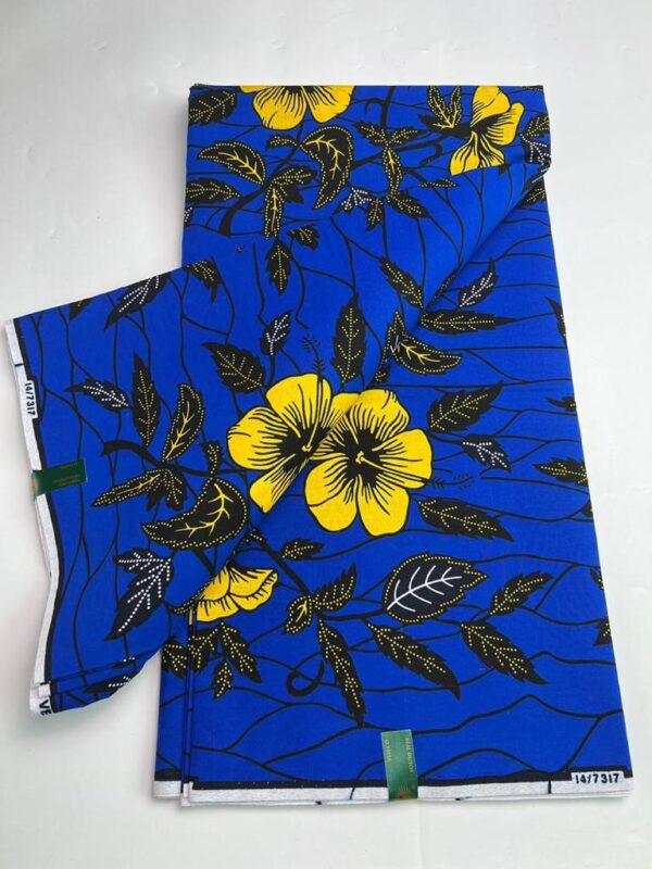 A blue and yellow floral print fabric.