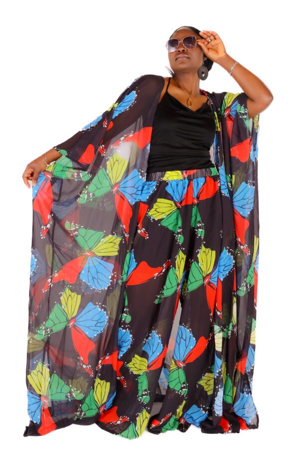 Woman in a butterfly patterned dress.