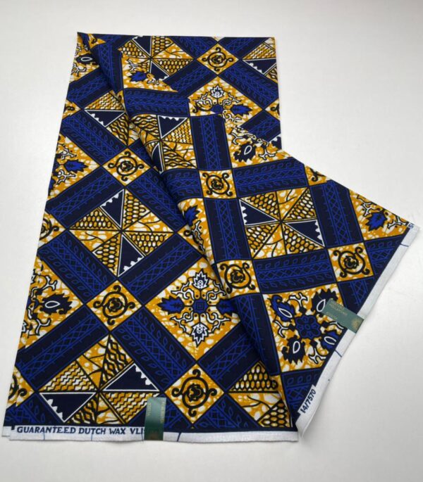 Blue and gold patterned Dutch wax fabric.