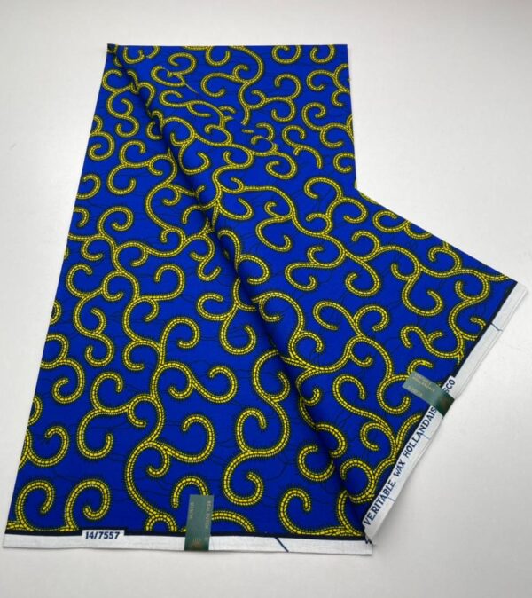 Blue fabric with yellow swirl pattern.