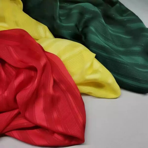 Red, yellow, and green striped fabric.