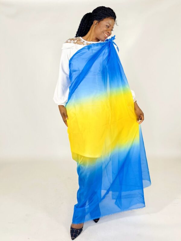 Woman in blue and yellow ombre dress.