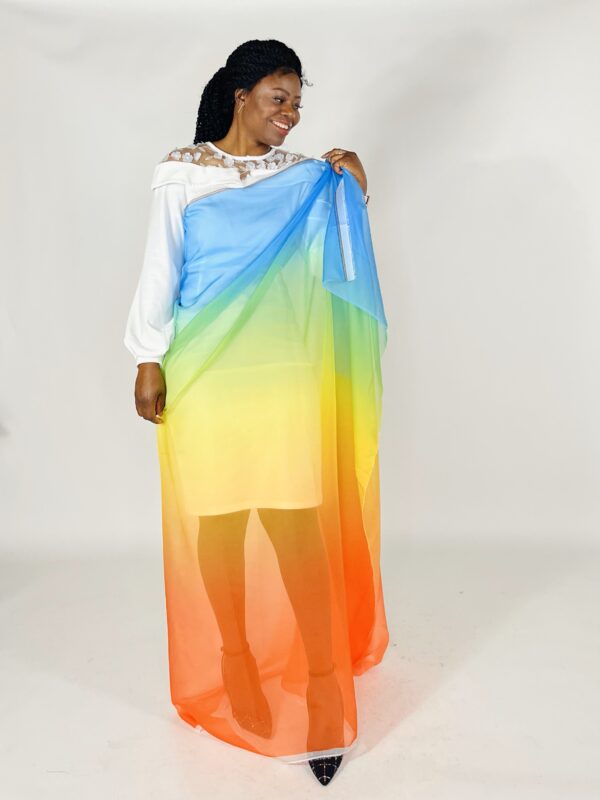 Woman wearing a rainbow ombre dress.