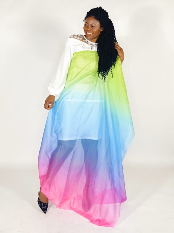 Woman in rainbow ombre dress and heels.