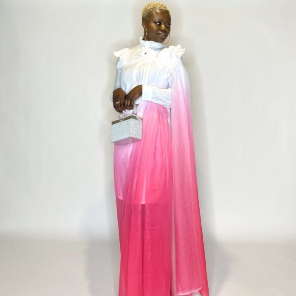 Woman in white shirt and pink ombre saree.