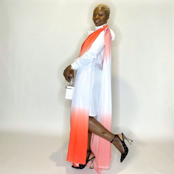 Woman in white shirt and ombre scarf.