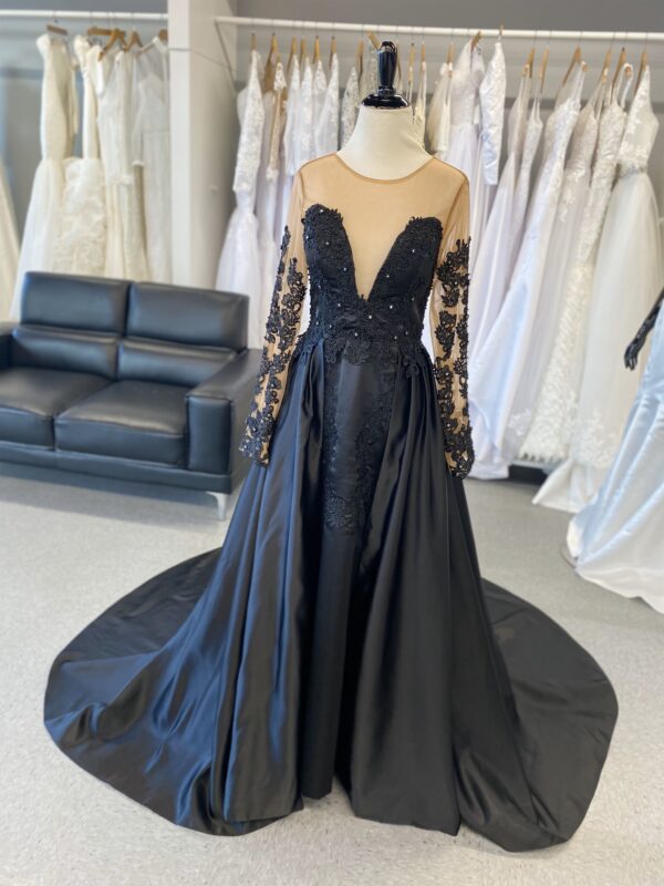 Black lace and satin long-sleeved gown.