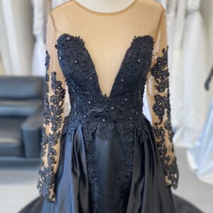 Black lace and satin long-sleeved gown.