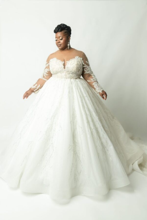 Bride in a white beaded wedding dress.