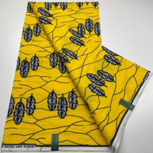 Yellow fabric with black and white leaf pattern.