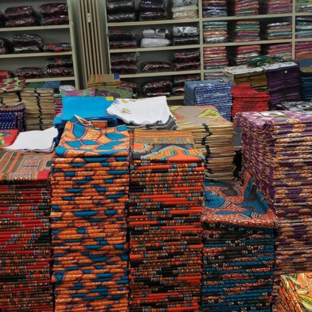 Stacks of colorful patterned fabric.